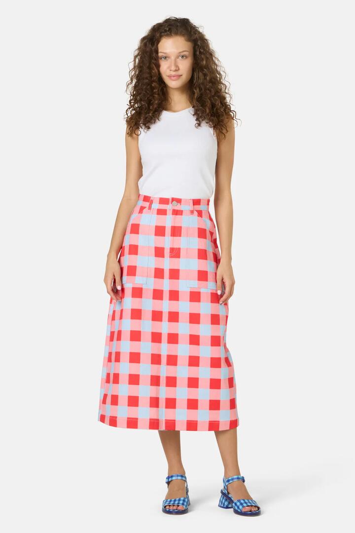 Image of a model wearing Skirts. Product name - Gimme Gingham Denim Skirt in Check colour by brand - Gorman