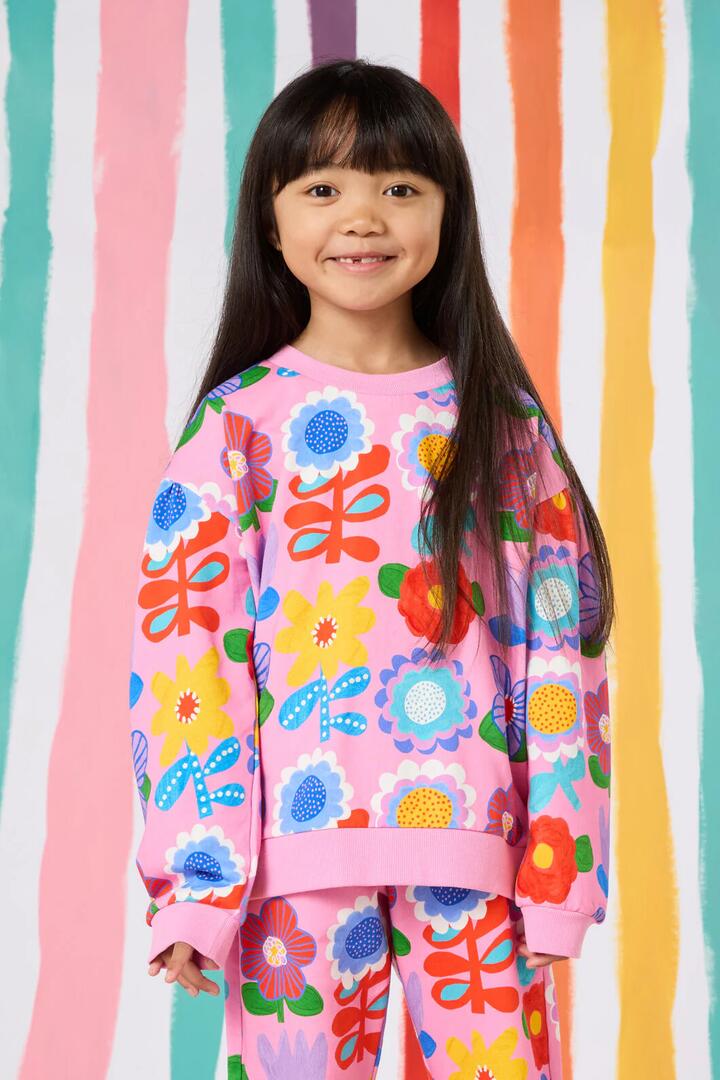 Image of a model wearing Outerwear. Productname: Geo Floral Kids Sweater in Pink colour by brand - Gorman