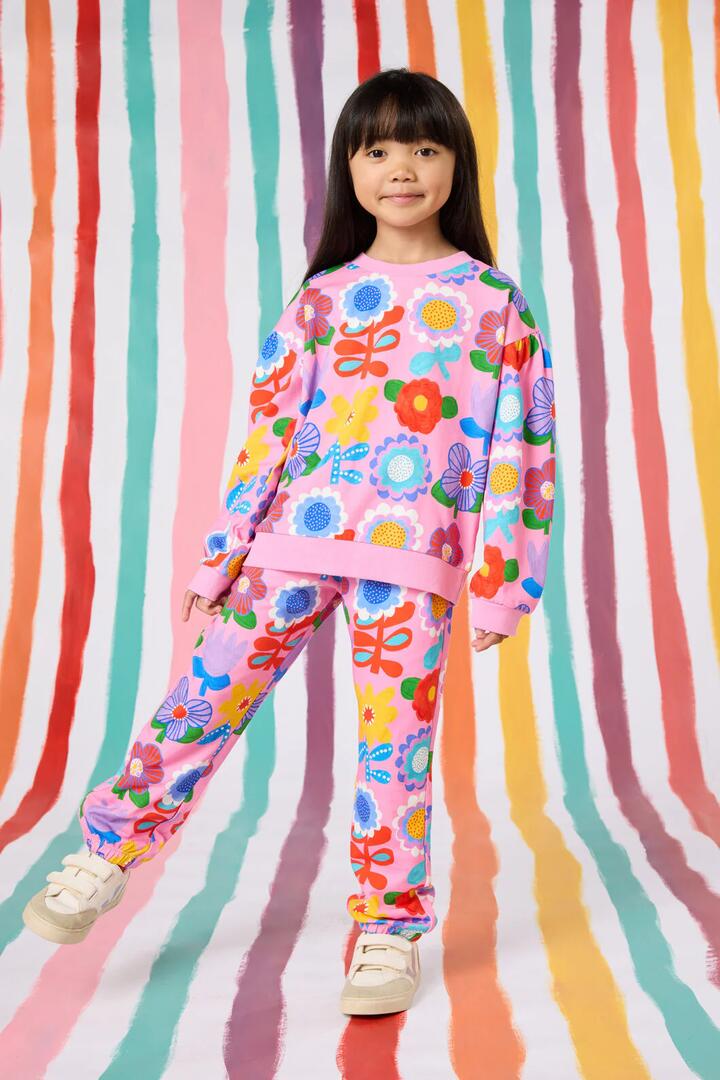 Image of a model wearing Pants. Productname: Geo Floral Kids Track Pant in Pink colour by brand - Gorman