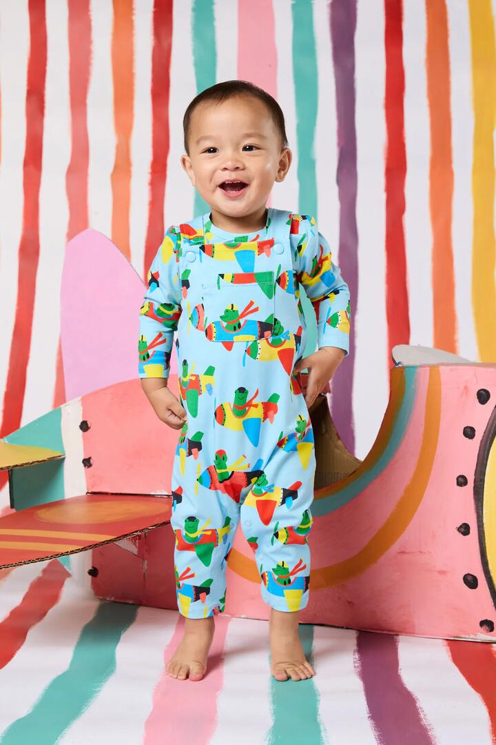 Image of a model wearing Pants. Product name - Flying Frogs Baby Overalls in Blue colour by brand - Gorman