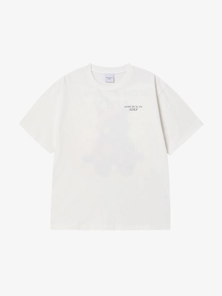 Image of a model wearing Tops. Productname: ADLV Ac Bear Basic Logo Short Sleeve T-Shirt in Cream colour by brand - ADLV