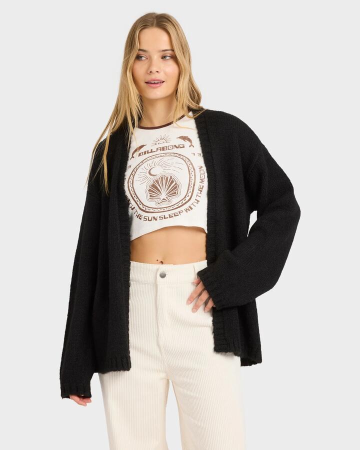 Image of a model wearing Outerwear. Productname: Billabong Womens Soft Sun Open Front Cardigan Black Pebble - in Black Pebble colour by brand - Billabong