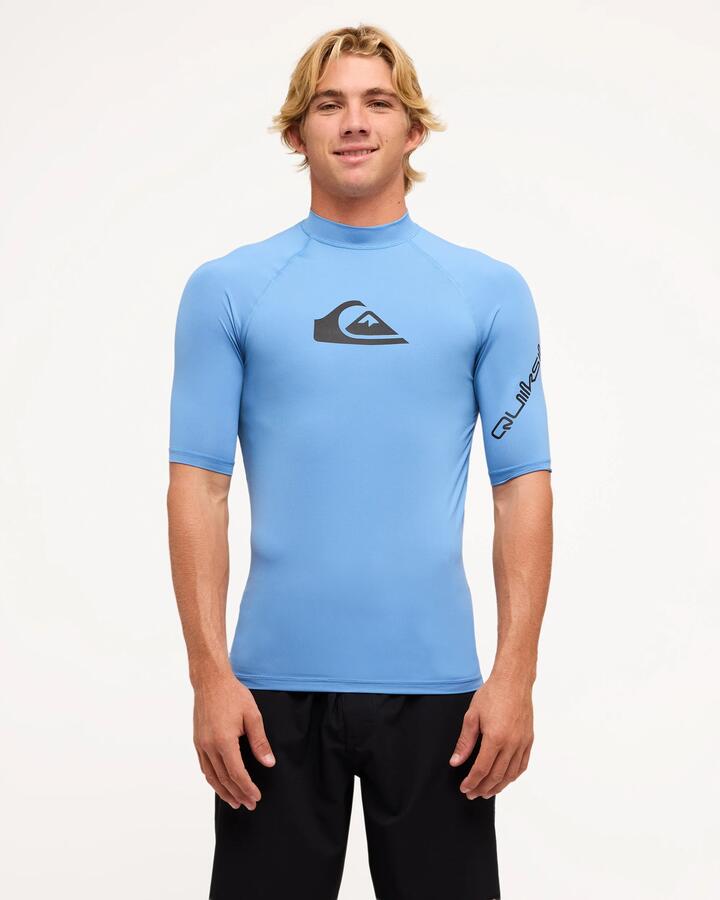 Image of a model wearing Tops. Product name - Quiksilver Mens All Time Short Sleeve Rash Vest Riviera in Riviera colour by brand - Quiksilver