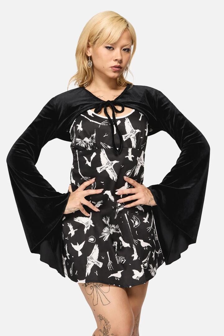 Image of a model wearing Tops. Productname: Wingspan Goth Sleeve in Black colour by brand - Black Friday