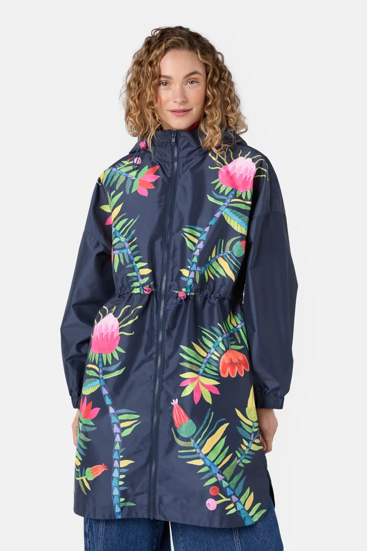 Image of a model wearing Rain Coats. Product name - Pretty Protea Long Raincoat in Navy colour by brand - Gorman