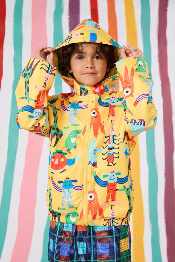 Image of a model wearing Rain Coats. Productname: Monster Play Kids Raincoat in Yellow colour by brand - Gorman