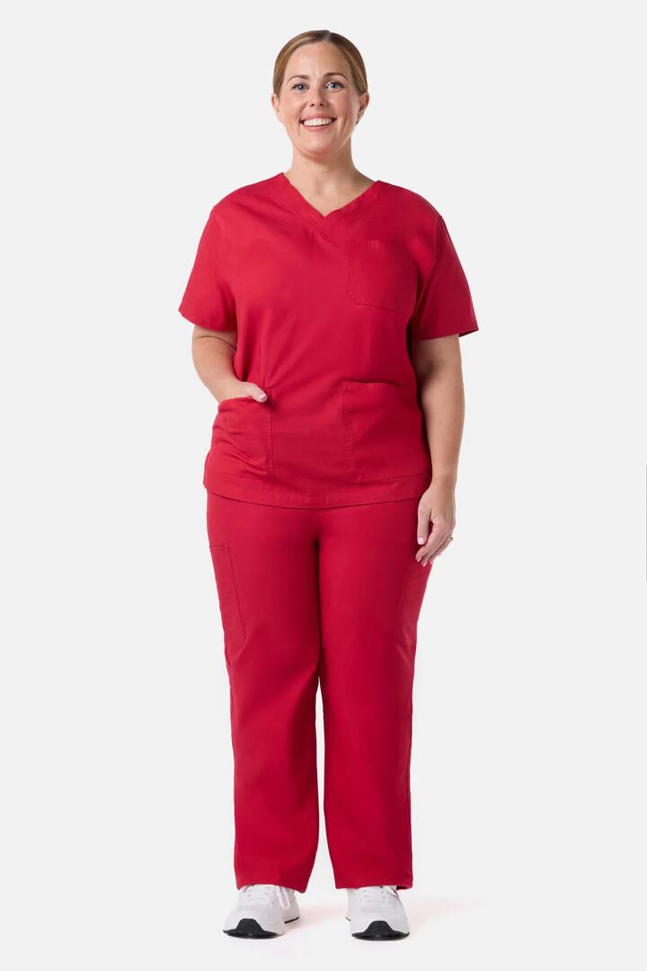 Image of a model wearing Uniforms & Workwear. Productname: Scrubs With Love Red Scrub Set in Red colour by brand - Scrubs With Love