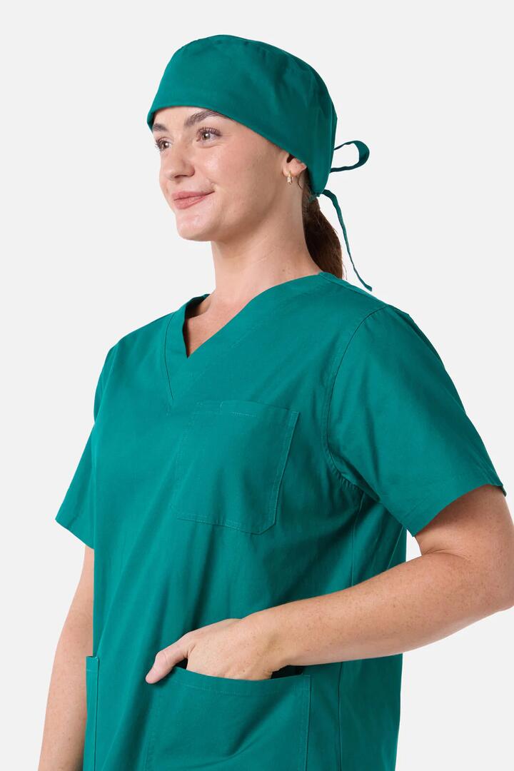 Image of a model wearing Uniforms & Workwear. Productname: Scrubs With Love Pine Scrub Hat in Pine colour by brand - Scrubs With Love