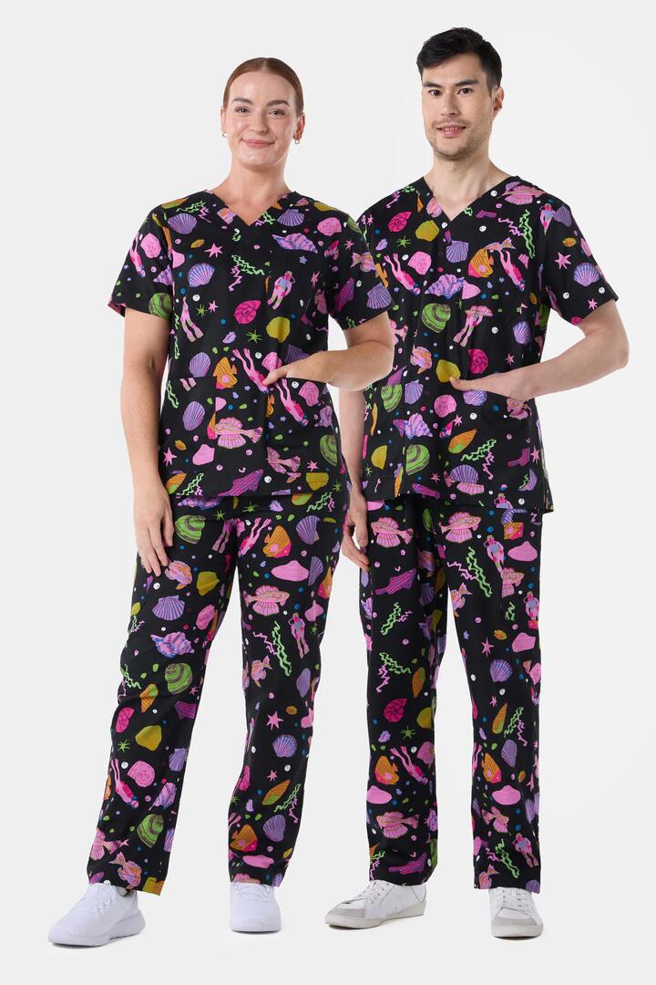 Image of a model wearing Uniforms & Workwear. Product name - Deep Dive Scrub Set in Black colour by brand - Gorman