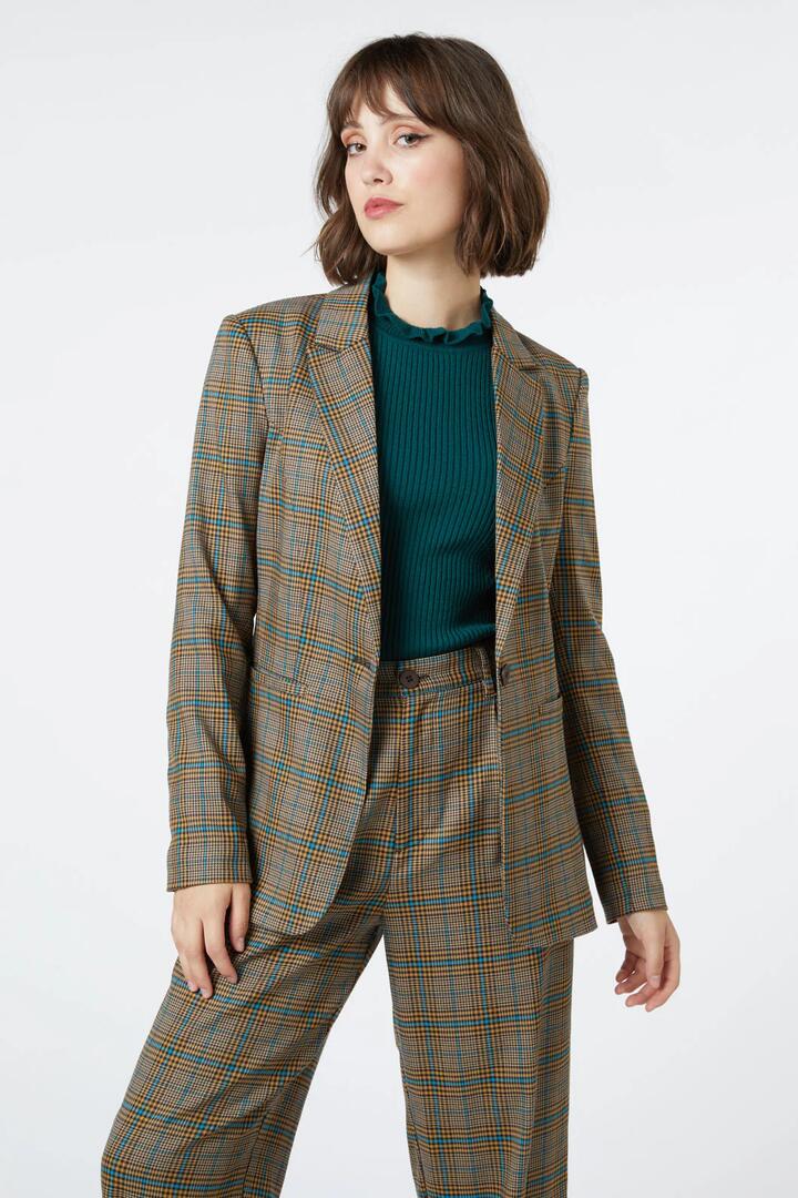 Image of a model wearing Outerwear. Productname: Courtney Blazer in Toffee colour by brand - Princess Highway