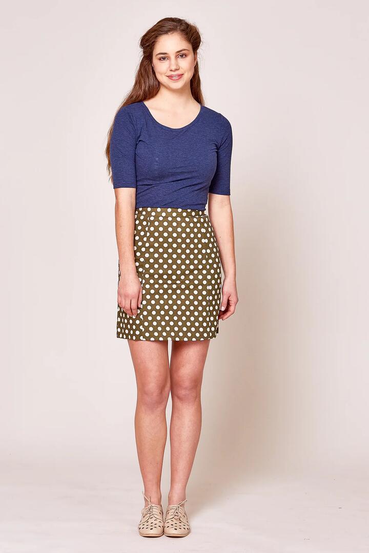 Image of a model wearing Skirts. Productname: Lucy Spot Skirt in Navy colour by brand - Princess Highway