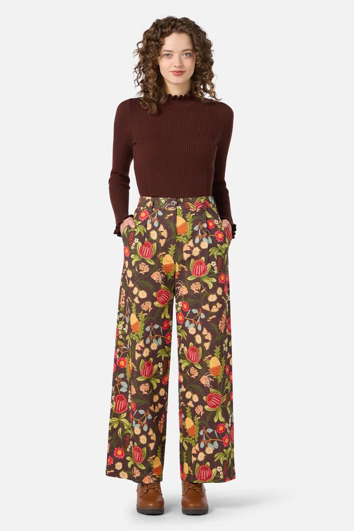 Image of a model wearing Pants. Productname: Florence Native Pant in Chocolate colour by brand - Princess Highway