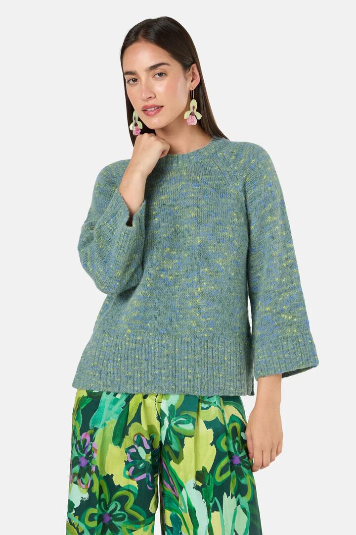 Image of a model wearing Outerwear. Product name - Grass Is Greener Jumper in Green colour by brand - Gorman