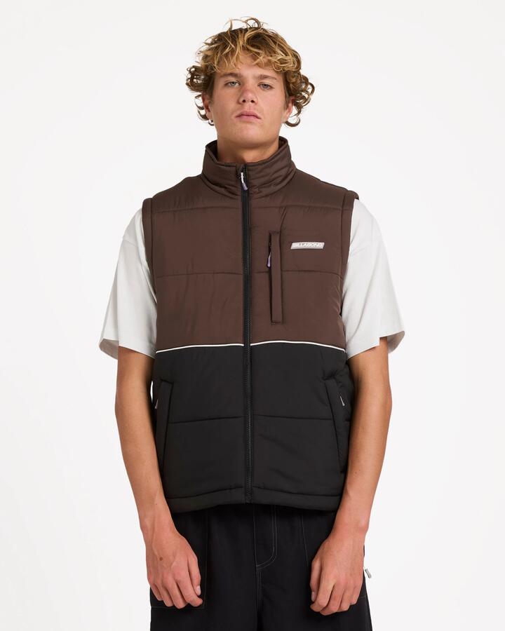 Image of a model wearing Outerwear. Product name - Billabong Mens Journey Puffer Vest Black in Black colour by brand - Billabong