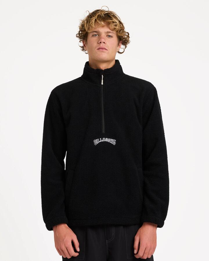 Image of a model wearing Outerwear. Product name - Billabong Mens Boundary Mockneck Fleece Jumper Black in Black colour by brand - Billabong