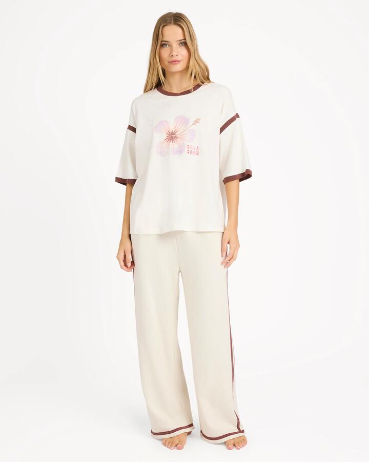 Image of a model wearing Pants. Product name - Billabong Womens Back To It Track Pants Salt Crystal in Salt Crystal colour by brand - Billabong