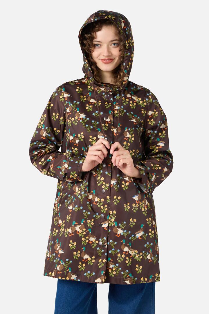 Image of a model wearing Rain Coats. Productname: Sweet Ducks Raincoat in Chocolate colour by brand - Princess Highway