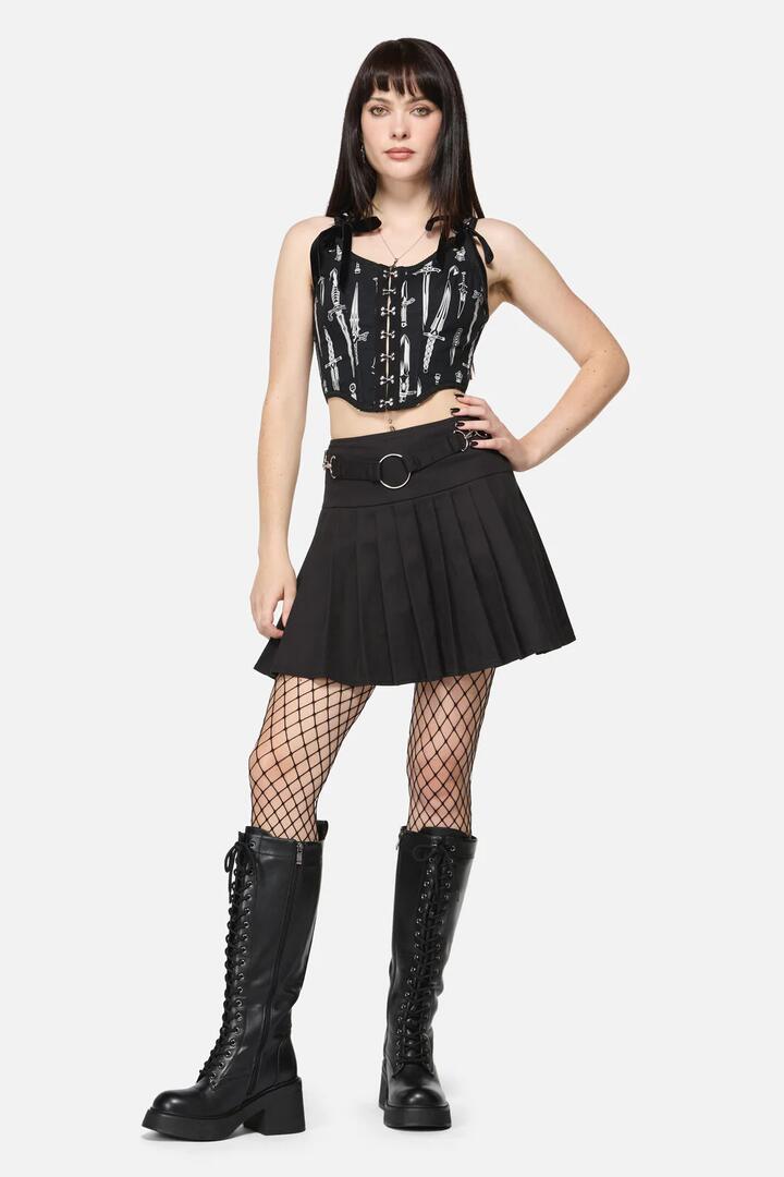Image of a model wearing Skirts. Productname: Avril Goth Skort in Black colour by brand - Dangerfield