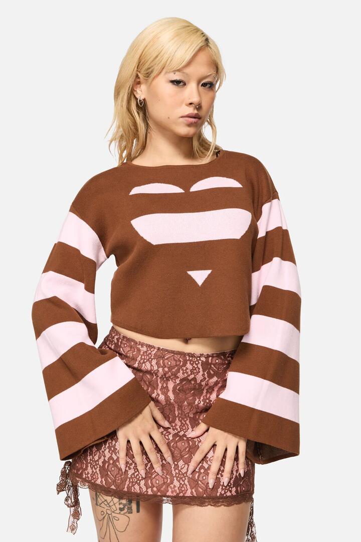 Image of a model wearing Tops. Productname: Increasing Silence Cropped Knit in Pink/Brown colour by brand - Black Friday