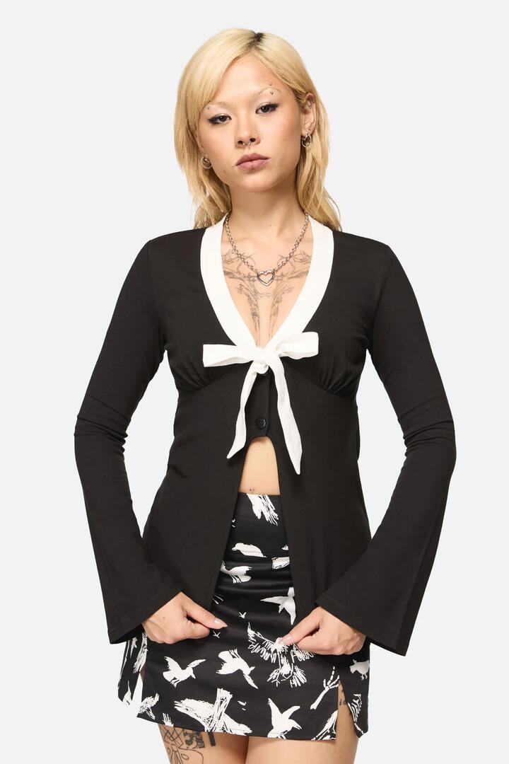 Image of a model wearing Tops. Productname: Wingspan Goth Top in Black colour by brand - Black Friday