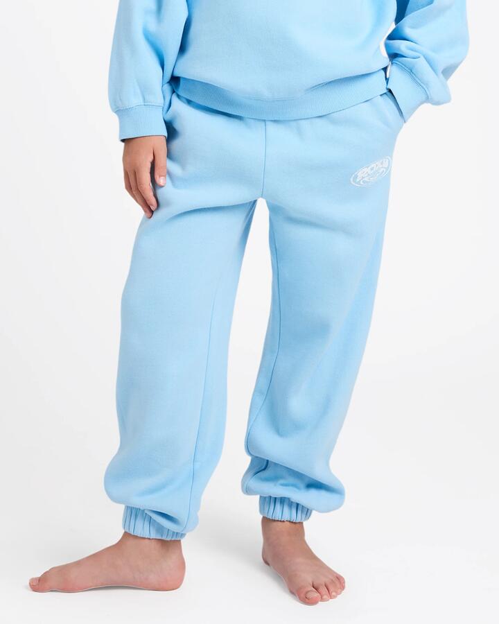Image of a model wearing Pants. Product name - Roxy Girls 4-16 Rg Endless Days Trackpants Sky Blue in Sky Blue colour by brand - Roxy