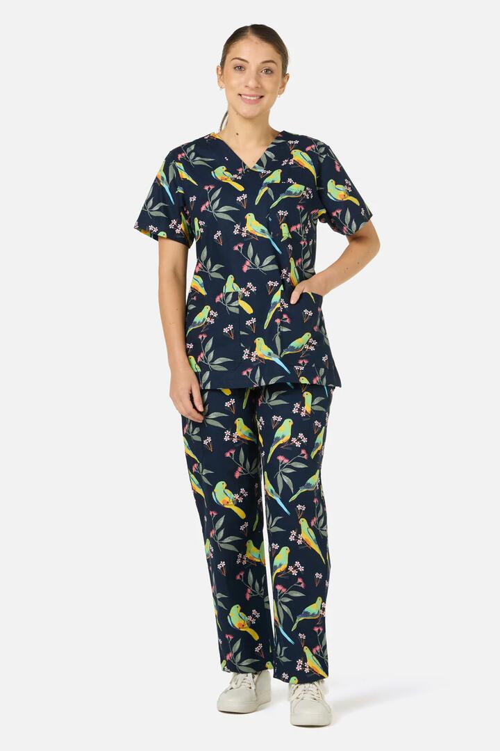 Image of a model wearing Uniforms & Workwear. Productname: Parrot Scrub Set in Navy colour by brand - Scrubs With Love