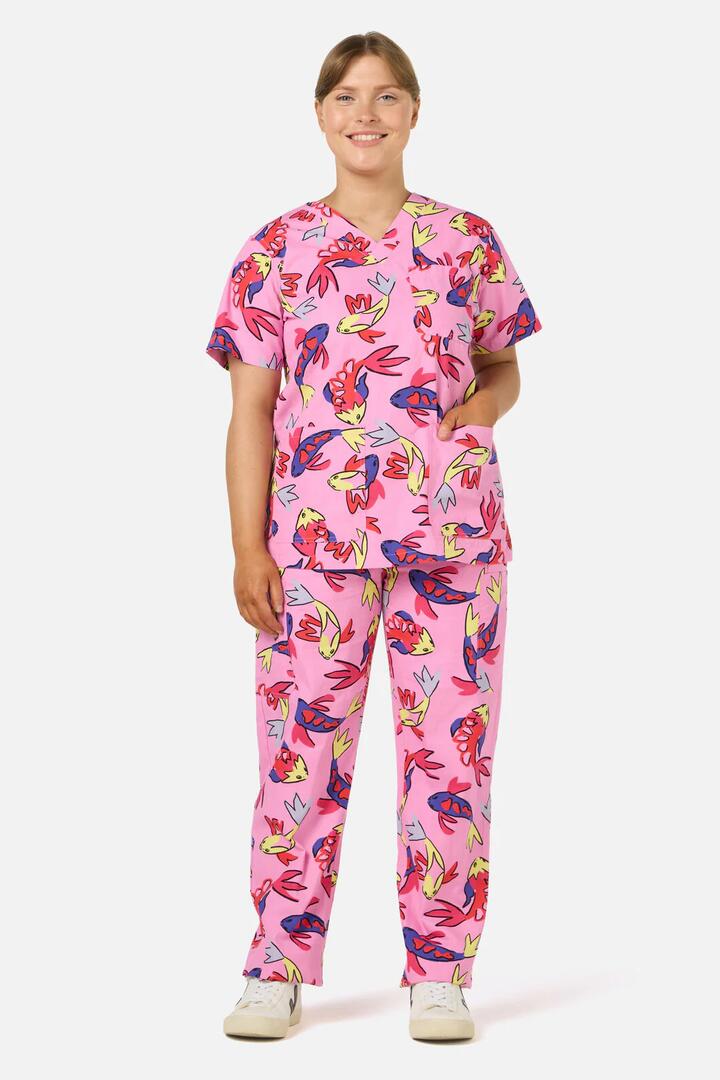 Image of a model wearing Uniforms & Workwear. Product name - Koi Pond Scrub Set in Pink colour by brand - Gorman