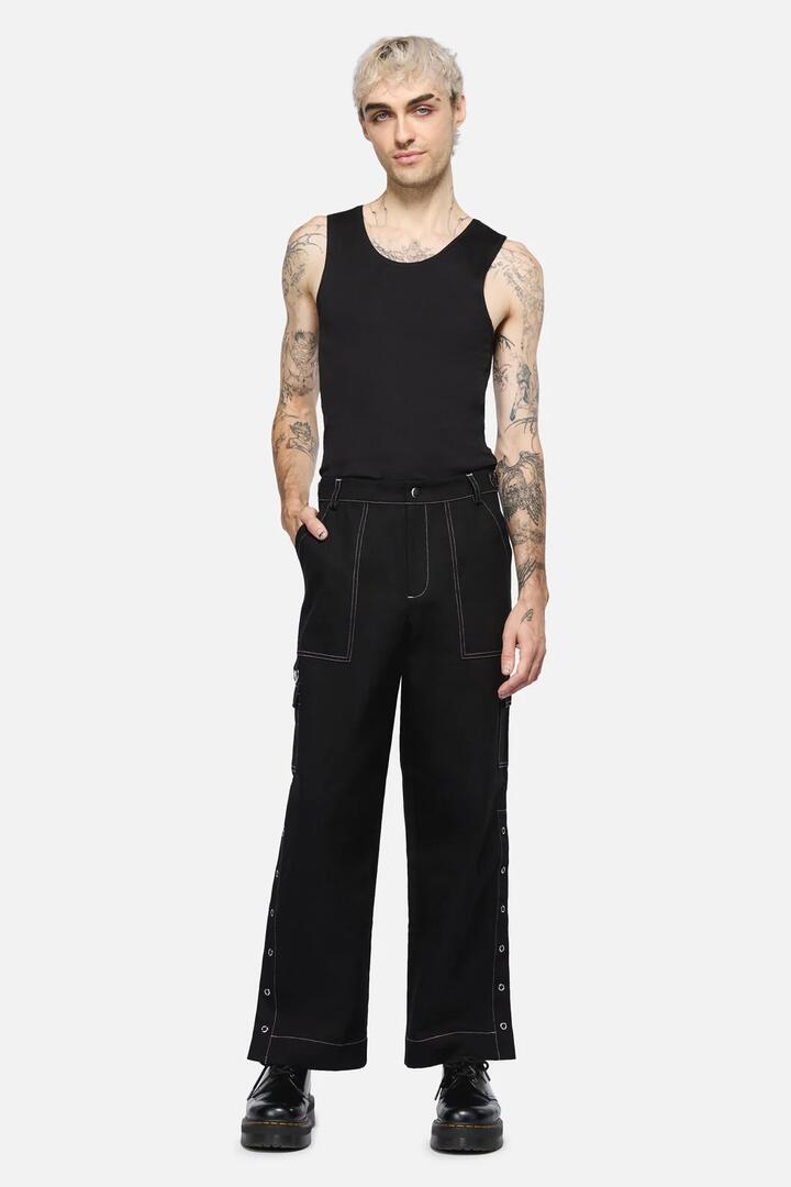 Image of a model wearing Pants. Productname: Wingspan Goth Pant in Black colour by brand - Black Friday