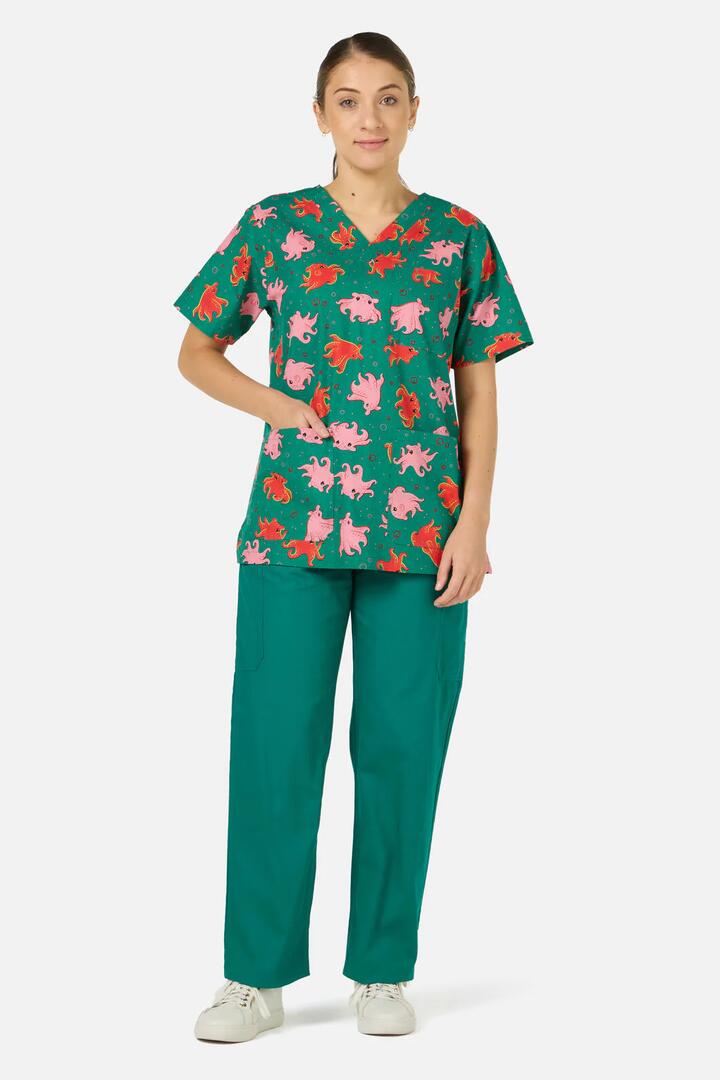 Image of a model wearing Uniforms & Workwear. Productname: Octopi Top & Pant Scrub Set in Blue colour by brand - Scrubs With Love