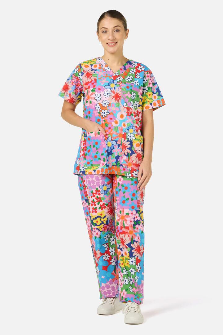 Image of a model wearing Uniforms & Workwear. Product name - Floral Field Scrub Set in Multi colour by brand - Gorman