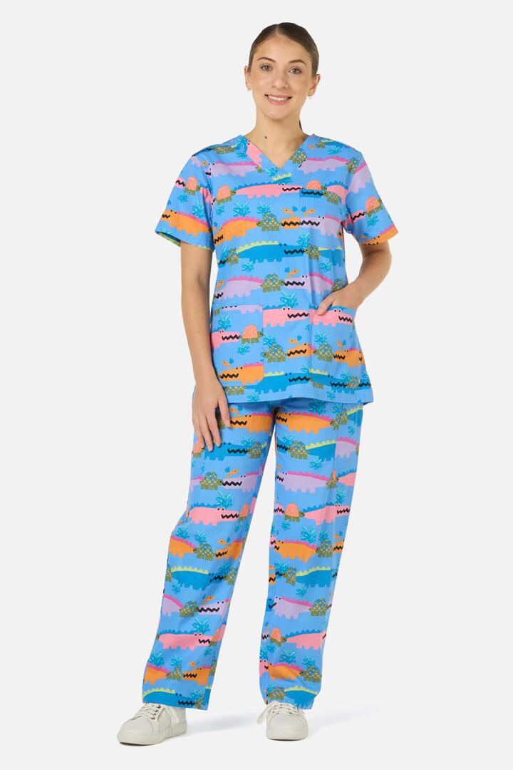 Image of a model wearing Uniforms & Workwear. Product name - Croc Snap Scrub Set in Blue colour by brand - Gorman