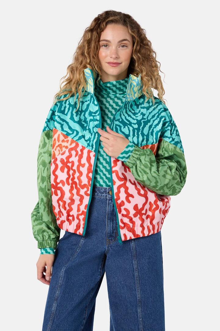 Image of a model wearing Rain Coats. Product name - Zellige Patch Raincoat in Print colour by brand - Gorman