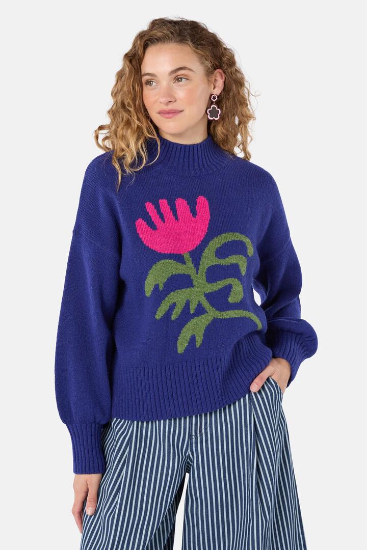 Image of a model wearing Outerwear. Product name - Moroccan Flower Jumper in Blue colour by brand - Gorman