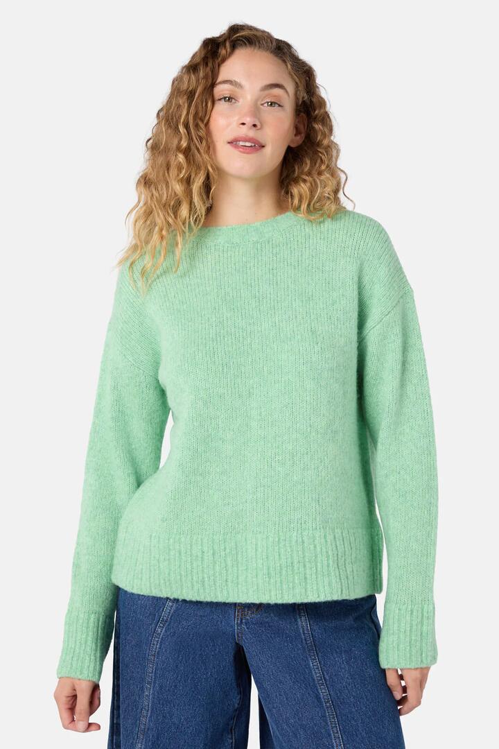 Image of a model wearing Outerwear. Product name - Hazel Jumper in Mint colour by brand - Gorman