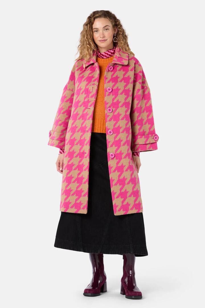 Image of a model wearing Outerwear. Product name - Houndstooth Pink Coat in Pink colour by brand - Gorman