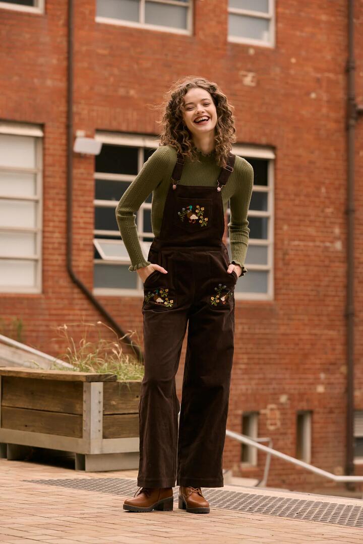 Image of a model wearing Pants. Productname: Sweet Ducks Embroidered Cord Overall in Chocolate colour by brand - Princess Highway