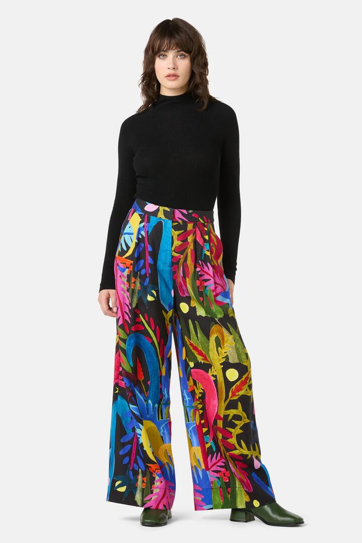 Image of a model wearing Pants. Product name - Night Garden Wide Pant in Print colour by brand - Gorman