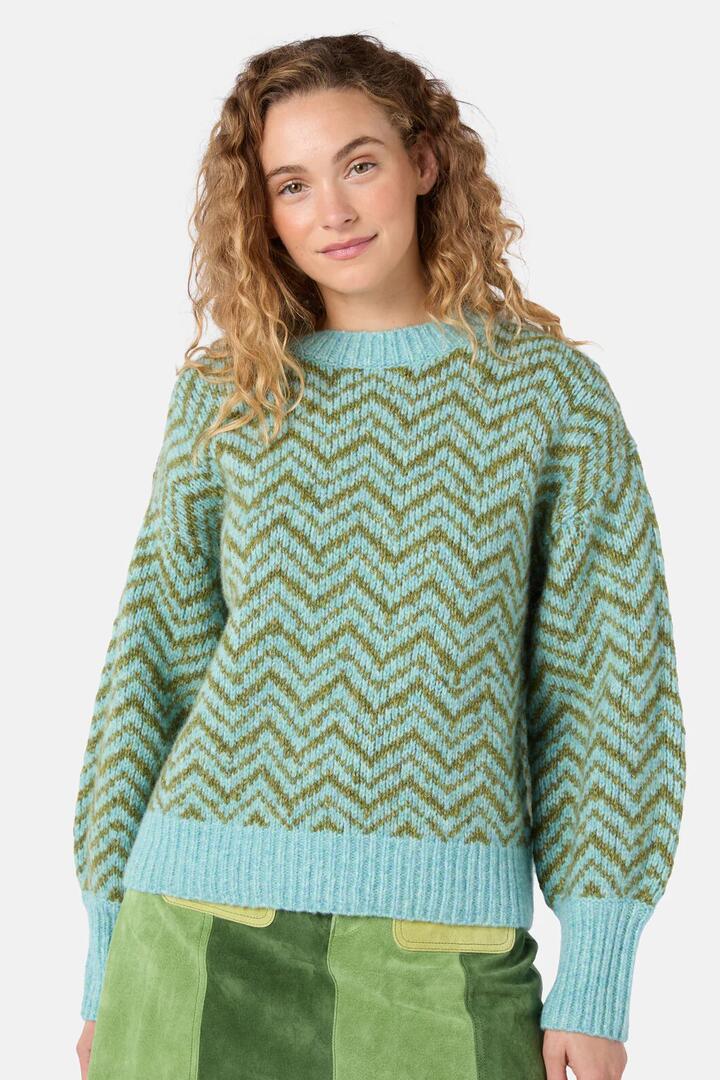 Image of a model wearing Outerwear. Product name - Moroccan Stripe Jumper in Green colour by brand - Gorman