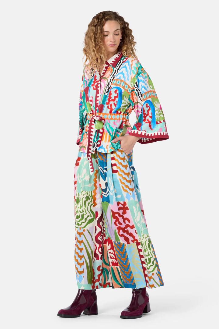 Image of a model wearing Pants. Product name - Zellige Patch Skort in Print colour by brand - Gorman