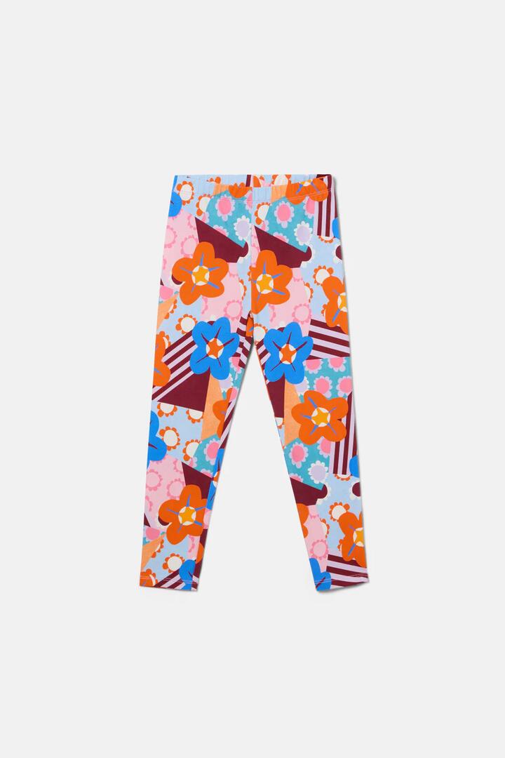 Image of a model wearing Pants. Product name - Cut Out Flower Kids Legging in Multi colour by brand - Gorman
