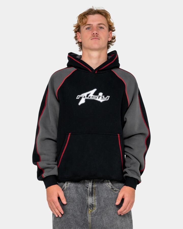 Image of a model wearing Outerwear. Product name - Rusty Mens Paneka Pullover Hoodie Black in Black colour by brand - Rusty