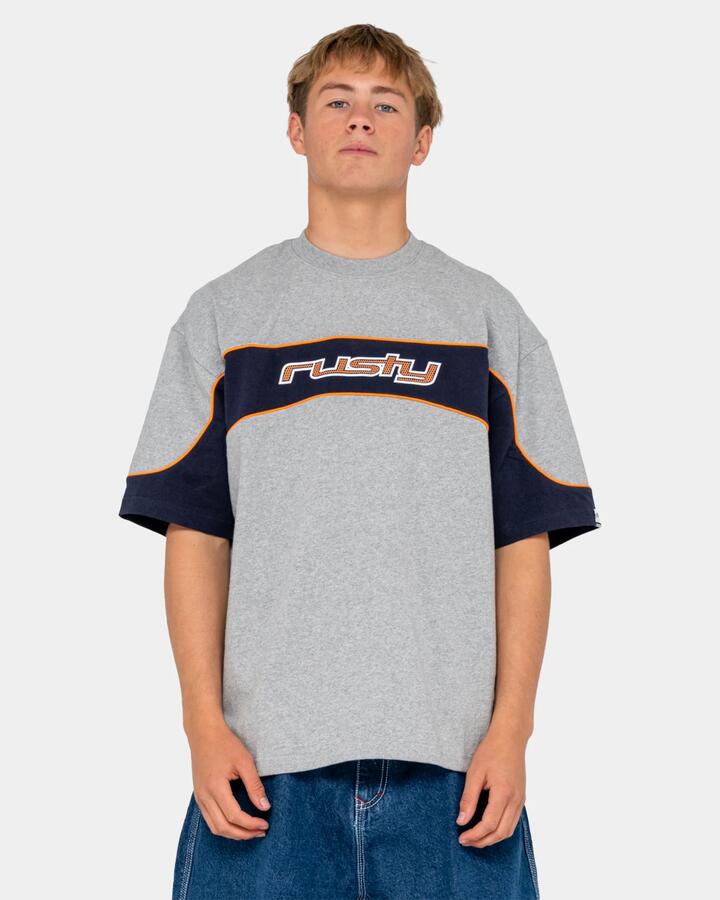 Image of a model wearing Tops. Product name - Rusty Mens Kinetic Short Sleeve Heavy T-Shirt Grey Marle in Grey Marle colour by brand - Rusty