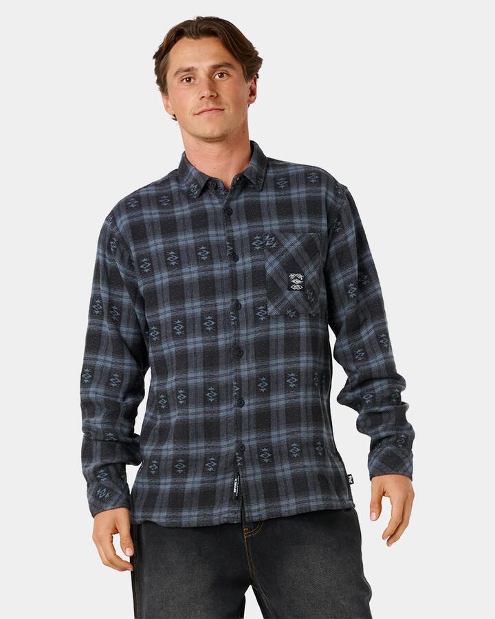 Image of a model wearing Tops. Product name - Rip Curl Mens Liquid Trips Flannel Long Sleeve Shirt Washed Black in Washed Black colour by brand - Rip Curl