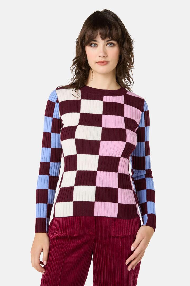 Image of a model wearing Tops. Product name - Check Merino Knit Top in Check colour by brand - Gorman