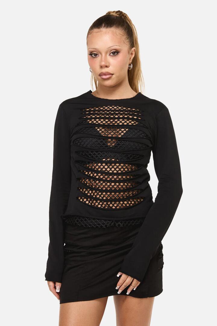 Image of a model wearing Tops. Productname: Eyes Closed Distressed Top in Black colour by brand - Dangerfield