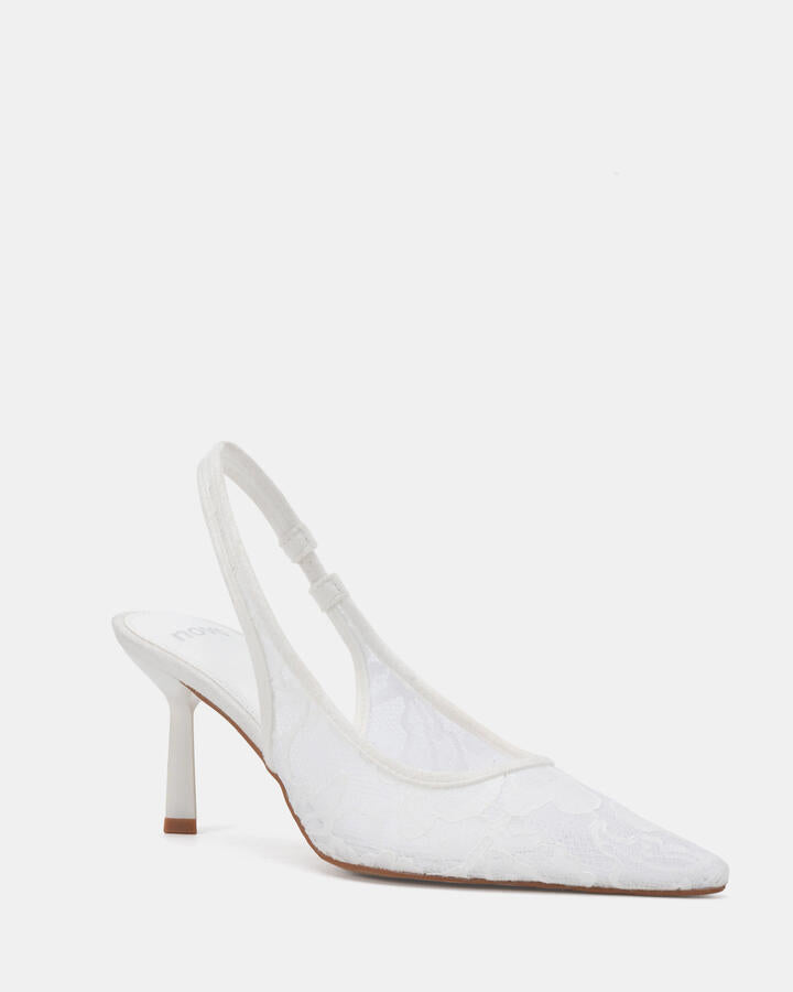 Image of a model wearing Skirts. Product name - Iraya White Lace Pumps in White Lace colour by brand - Novo