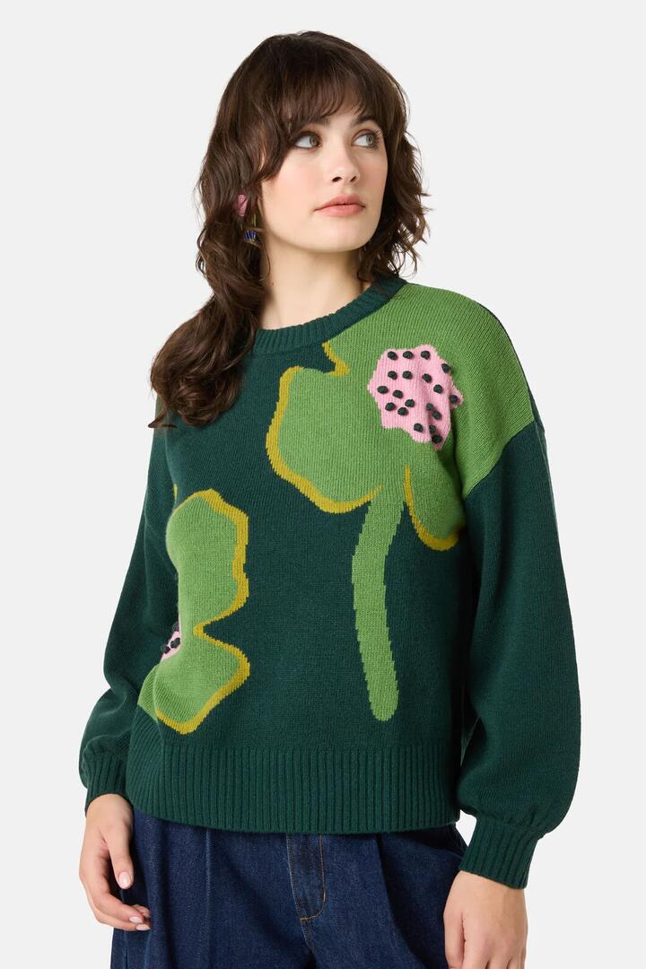 Image of a model wearing Outerwear. Product name - Seedlings Flower Jumper in Multi colour by brand - Gorman