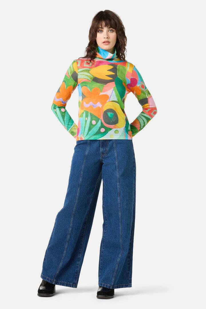 Image of a model wearing Tops. Product name - Warm Winter Merino Polo in Print colour by brand - Gorman