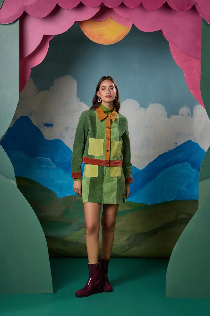 Image of a model wearing Skirts. Product name - 70âs Patch Suede Skirt in Multi colour by brand - Gorman