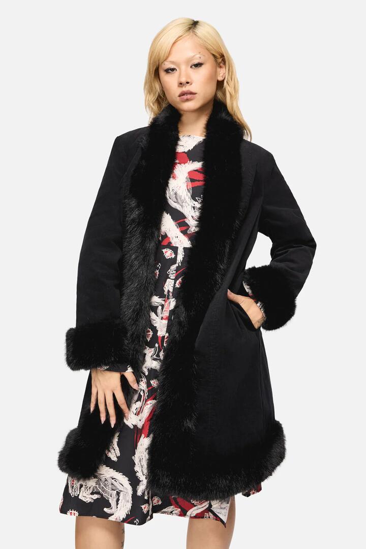 Image of a model wearing Outerwear. Productname: Wolves Velvet Coat in Black colour by brand - Black Friday